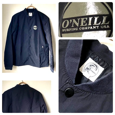 Chaqueta cortavientos O’Neill Surfing Company EE. UU. lista de nailon franquicia L Foto 1 de 4