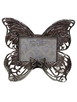 Sheffield Home 2007 Enchanted Accessories New York marco de mariposa de metal 6x4 pulgadas Foto 1 de 4