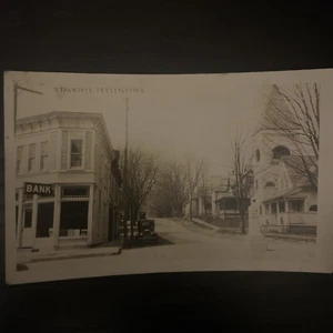 Wyalusing Pennsylvania RPPC Corner View With Bank - Picture 1 of 10