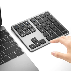 Clavier numérique sans fil compatible Bluetooth 35 touches double mode - Photo 1/14