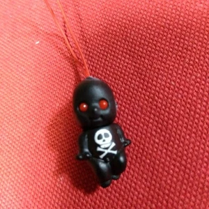 black kewpie strap HD - Bild 1 von 3