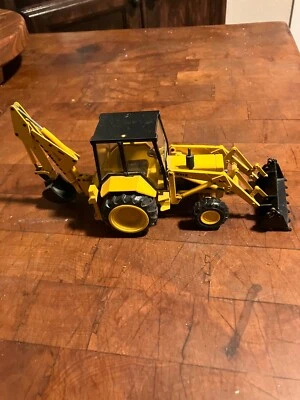 Conrad 1/35th Scale Massey Ferguson 50HX Loader With MF 450 Backhoe - Image 1 of 4