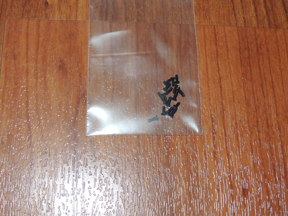 Juego de tornillos originales genuinos para cámara Nikon Coolpix L840 Foto 1 de 1