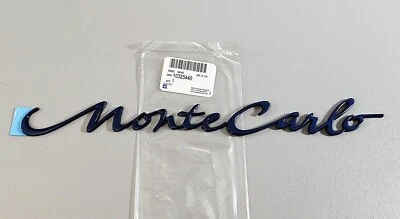 New Genuine GM 00-05 Monte Carlo Blue Quarter Panel Mounted Emblem Fits LH or RH - Image 1 of 4