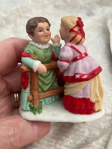 Lefton christmas figurine. 01346. two ladies talking at a fence. 2.5 inches. - Picture 1 of 4