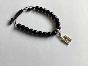 Pulsera Thomas Sabo de plata de ley obsidiana negra con dije de letra H - Imagen 1 de 5
