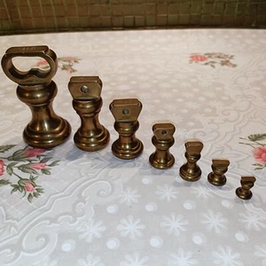 VINTAGE BRASS BELL WEIGHTS FOR KITCHEN SCALES SET OF 7 IMPERIAL WEIGHTS - Picture 1 of 6