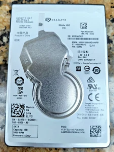 Hard Disk Drive Dell 2J7C1 (Seagate ST1000LM035) 2.5 Inches 1 TB Hard Disk - Picture 1 of 4