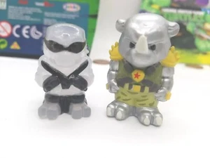 2 TMNT Ninja Turtles OOSHIES Pencil Toppers B&W LEONARDO & TITANIUM ROCKSTEADY - Picture 1 of 12