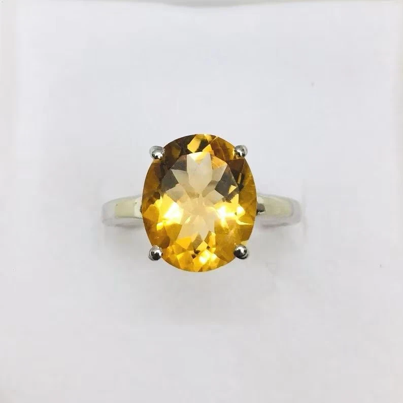 Anillo de compromiso de oro blanco sólido de 14 K de citrino natural y diamantes de corte ovalado de 4,50 quilates Foto 1 de 4