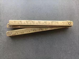 ANCIEN PETIT METRE PLIANT EN LAITON 1 METRE - Foto 1 di 3