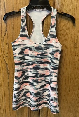 Camiseta sin mangas LULULEMON Wamo camuflada apenas rosa fresca espalda deportiva talla 4 usada una vez Foto 1 de 4
