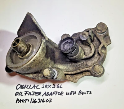 ADAPTADOR FILTRO ACEITE CADILLAC SRX 3.6L CON PERNOS - USADO Foto 1 de 3