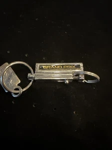 Vintage Pontiac Grand Prix Spring Keychain Nice - Picture 1 of 3