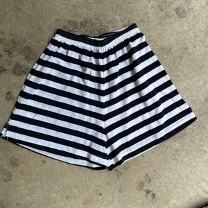 Vintage 90er weiß und schwarz gestreift Stretch Shorts Damen Medium - Bild 1 von 3