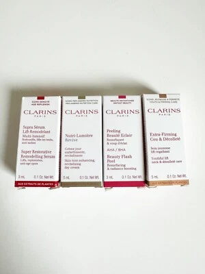 4 packs CLARINS Super Restorative Serum Youthful Lift - Day Cream - Peel Samples - Image 1 of 3