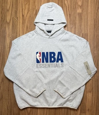 Sudadera con capucha Fear of God Essentials NBA gris jaspeado claro XLARGE Foto 1 de 4
