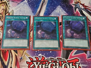 Yu-Gi-Oh! 3x Foolish Burial Goods RATE-EN065 Secret Rare 1st Ed NM/Mint - Picture 1 of 1