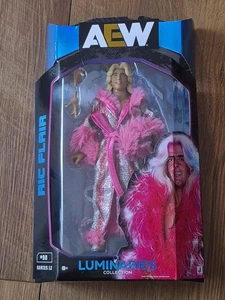  AEW Unmatched Luminaries Collection RIC FLAIR #90 Series 12 PINK Robe IN HAND  - Bild 1 von 2