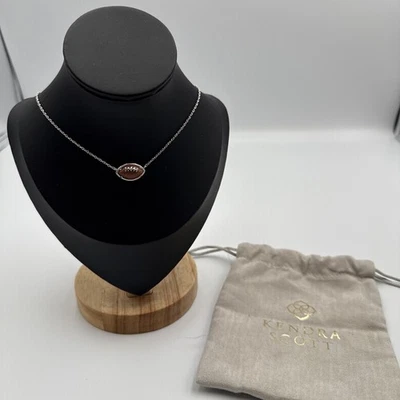 NEW 100%  KENDRA SCOTT  Orange Goldstone Football Silver Short Pendant Necklace - Image 1 of 4