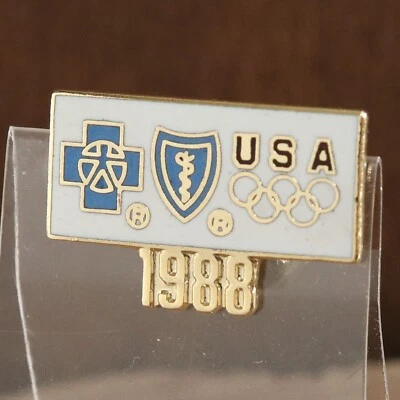 1988 Blue Cross Blue Shield USA Team Olympics Sponsor Lapel Pin Calgary Seoul - Image 1 of 4