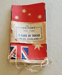 WW1 UNUSED VICTORY FLAG GARLAND 7 FLAGS ON THREAD RED ENSIGN BIRDWOOD UNION JACK - Picture 1 of 3