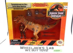 Tyrannosaurus Rex with Dino Hunter Jurassic Park Dinosaurs 1999 Hasbro SEALED - Picture 1 of 4