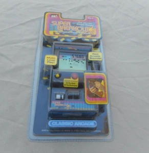 NUOVO SUPER BREAKOUT Ultimate Arcade Classic gioco elettronico portatile ~ SPEDIZIONE GRATUITA - Foto 1 di 4