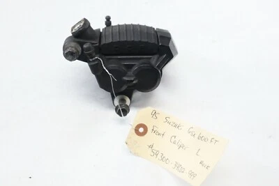 Pinza de freno delantera izquierda para motocicleta Suzuki 1995 Katana GSX600 59300-34C02 FABRICANTE DE EQUIPOS ORIGINALES Foto 1 de 4
