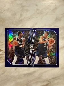 2023-24 Optic - Optical Illusions Kyrie Irving, Luka Dončić #4 Purple Prizm - Bild 1 von 2