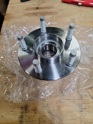 Conjunto de cojinete de rueda y buje Magneti Marelli 1AMH512163 FORD, MERCURY Foto 1 de 2