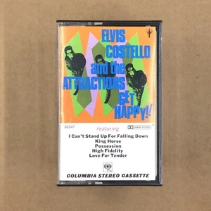 ELVIS COSTELLO Cassette Tape 80s New Wave GET HAPPY NEW AMSTERDAM ATTRACTIONS - Picture 1 of 6