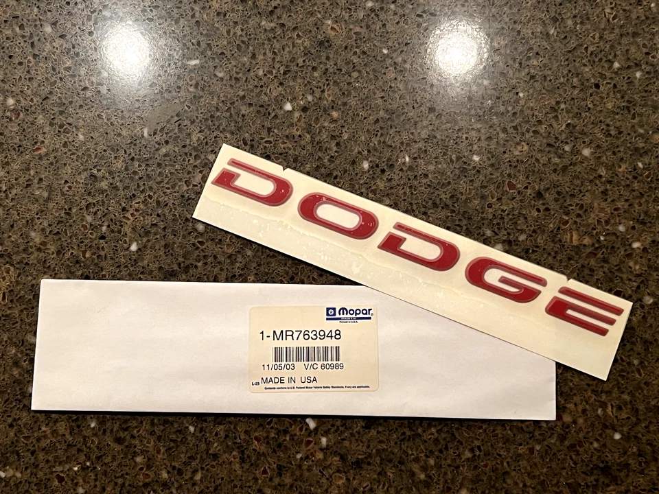 1997-99 Dodge Avenger Door Emblem RED Mopar MR763948 - Image 1 of 1