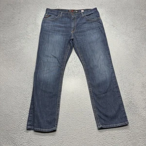 Ariat FR Low Rise M4 Relaxed Boot Jeans Men 38x32 Blue Fire Resistant CAT2 Denim - Picture 1 of 8