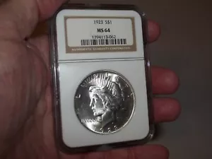 Vintage Antique 1923 NGC MS64 Peace Dollar 90% Silver nice features (062) - Picture 1 of 4