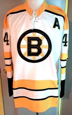 Camiseta deportiva Bobby Orr Boston Bruins blanca y dorada "1968-1974 retroceso" CCM NHL Foto 1 de 2