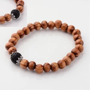 Pulsera elástica de cuentas de lava negra natural y madera. Pulsera difusora de aceites esenciales - Imagen 1 de 5