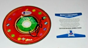 KESHA signed (RAINBOW) CD *FULL NAME* W/COA *KE$HA*autographed (PRAYING) BECKETT - Picture 1 of 1