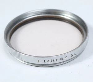 LEICA LEITZ NY SL 42MM SKYLIGHT FILTER IN THE CASE AND BOX CLEAN GLASS & RING - Picture 1 of 6