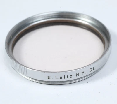 LEICA LEITZ NY SL 42MM SKYLIGHT FILTER IN THE CASE AND BOX CLEAN GLASS & RING - Image 1 of 4