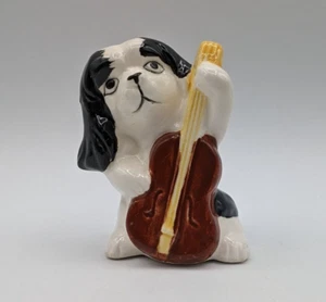 Statuina ceramica violoncello cane spaniel antropomorfo vintage strumento musicista Giappone - Foto 1 di 8