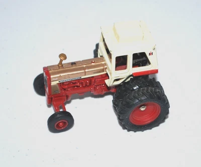 Vintage ERTL  Internarial Turbo 1456 Tractor Red/White and Gold 1/64 Scale. - Image 1 of 4