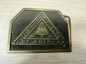 Vintage 1976 Telephone Pioneers of America Brass Belt Buckle - Adezy - Picture 1 of 9