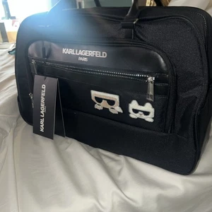 Karl Lagerfeld Paris RARE Black Duffle Bag Luggage Travel Weekender NWT $349.99 - Picture 1 of 12