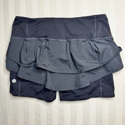 Falda LuluLemon Run Speed Squat Talla 6 Bolsillo con Cremallera Volantes Ligeros para Correr Foto 1 de 4