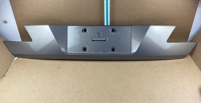 Parachoques trasero BMW 750i 750Li 2006-2008 panel de matrícula/moldura 7138423 OEM Foto 1 de 4