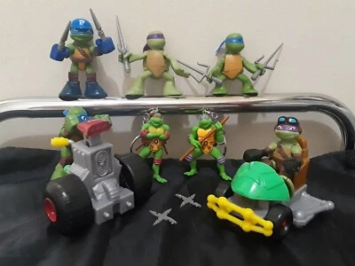 Teenage Mutant Ninja Turtles TMNT 2-2.5 in Figures, 2 Vehicles, Keychains Lot  - Image 1 of 4