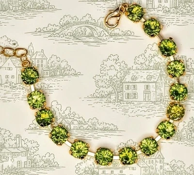Natural Green Peridot 12.75  Total Carats In Classic Gold Plated Tennis Bracelet - Image 1 of 4