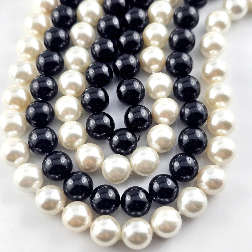Muschelkern Perlen 8mm weiß/schwarz A-Grade Strang 48 Stück SERAJOSY - Bild 1 von 1