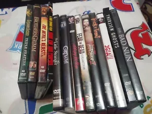 ROB ZOMBIE THE BAD NUN Horror DVD lot Leprechaun Hitcher JIGSAW SPAULDING - Picture 1 of 6